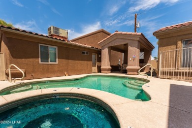 The perfect set up! Beautiful condo with an oversized, 2 car on London Bridge Golf Course in Arizona - for sale on GolfHomes.com, golf home, golf lot