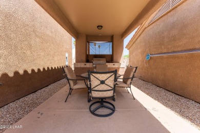 The perfect set up! Beautiful condo with an oversized, 2 car on London Bridge Golf Course in Arizona - for sale on GolfHomes.com, golf home, golf lot