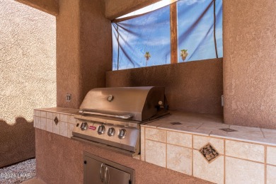 The perfect set up! Beautiful condo with an oversized, 2 car on London Bridge Golf Course in Arizona - for sale on GolfHomes.com, golf home, golf lot