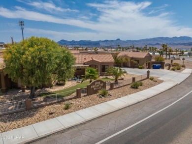 The perfect set up! Beautiful condo with an oversized, 2 car on London Bridge Golf Course in Arizona - for sale on GolfHomes.com, golf home, golf lot