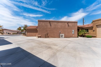 The perfect set up! Beautiful condo with an oversized, 2 car on London Bridge Golf Course in Arizona - for sale on GolfHomes.com, golf home, golf lot