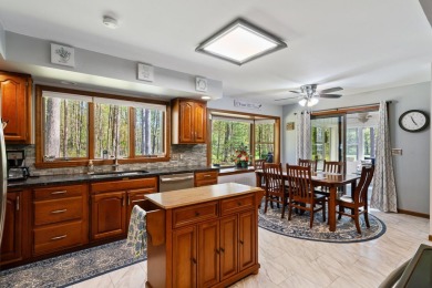 Beautifully crafted 3 bed, 2 full and 2 half bath home in the on Indian River Golf Club in Michigan - for sale on GolfHomes.com, golf home, golf lot