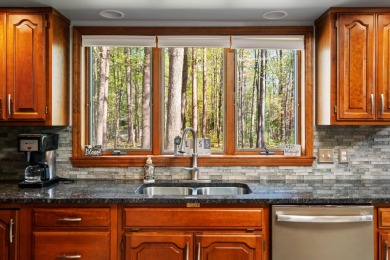 Beautifully crafted 3 bed, 2 full and 2 half bath home in the on Indian River Golf Club in Michigan - for sale on GolfHomes.com, golf home, golf lot