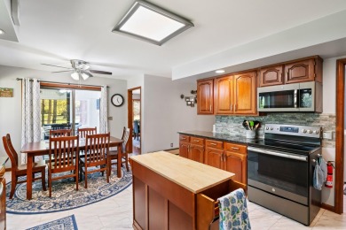 Beautifully crafted 3 bed, 2 full and 2 half bath home in the on Indian River Golf Club in Michigan - for sale on GolfHomes.com, golf home, golf lot