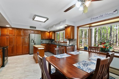 Beautifully crafted 3 bed, 2 full and 2 half bath home in the on Indian River Golf Club in Michigan - for sale on GolfHomes.com, golf home, golf lot