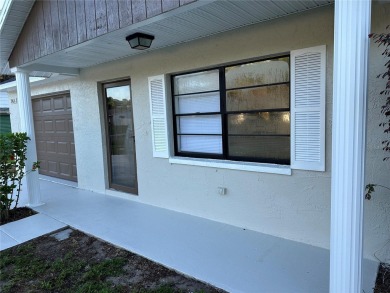 Move in ready! Remodeled just a few years ago. Two bedrooms with on Zephyrhills Municipal Golf Course in Florida - for sale on GolfHomes.com, golf home, golf lot