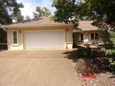 LOVELY 3 BEDROOM 2 BATH CUSTOM HOME ON THE 16TH HOLE OF CORONADO on Coronado Golf Course in Arkansas - for sale on GolfHomes.com, golf home, golf lot