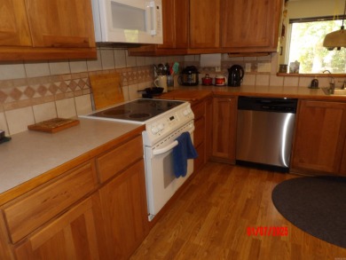 LOVELY 3 BEDROOM 2 BATH CUSTOM HOME ON THE 16TH HOLE OF CORONADO on Coronado Golf Course in Arkansas - for sale on GolfHomes.com, golf home, golf lot