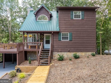 Come home to this impeccably maintained 3 BR/3 BA mountain cabin on White Path Golf Club in Georgia - for sale on GolfHomes.com, golf home, golf lot