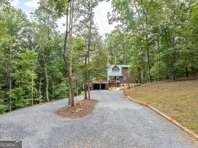 Come home to this impeccably maintained 3 BR/3 BA mountain cabin on White Path Golf Club in Georgia - for sale on GolfHomes.com, golf home, golf lot