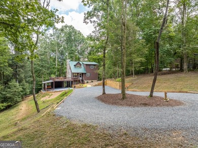 Come home to this impeccably maintained 3 BR/3 BA mountain cabin on White Path Golf Club in Georgia - for sale on GolfHomes.com, golf home, golf lot