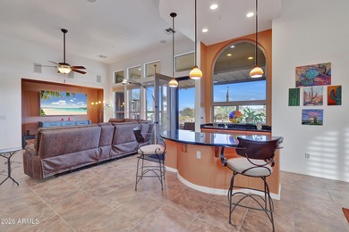 Exquisitely sited, this DISTINCTIVELY BEAUTIFUL LAKE FRONT GOLF on Trilogy Golf Club At Vistancia in Arizona - for sale on GolfHomes.com, golf home, golf lot