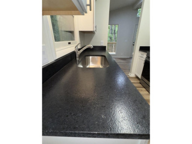 UPDATED: 2 bed 2 bath plus office. New roof, flooring, cabinets on Cortez Golf Course in Arkansas - for sale on GolfHomes.com, golf home, golf lot