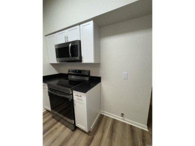 UPDATED: 2 bed 2 bath plus office. New roof, flooring, cabinets on Cortez Golf Course in Arkansas - for sale on GolfHomes.com, golf home, golf lot