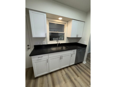 UPDATED: 2 bed 2 bath plus office. New roof, flooring, cabinets on Cortez Golf Course in Arkansas - for sale on GolfHomes.com, golf home, golf lot
