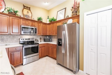 Spectacular views of the lake and golf course can be enjoyed on  in Florida - for sale on GolfHomes.com, golf home, golf lot