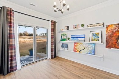 Welcome to effortless living in this inviting open-concept home on The Links At Stoney Point in South Carolina - for sale on GolfHomes.com, golf home, golf lot