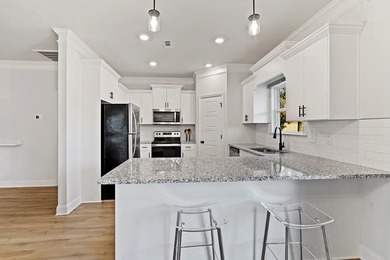 Welcome to effortless living in this inviting open-concept home on The Links At Stoney Point in South Carolina - for sale on GolfHomes.com, golf home, golf lot