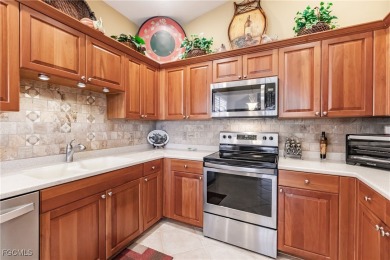 Spectacular views of the lake and golf course can be enjoyed on  in Florida - for sale on GolfHomes.com, golf home, golf lot