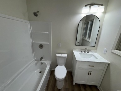 UPDATED: 2 bed 2 bath plus office. New roof, flooring, cabinets on Cortez Golf Course in Arkansas - for sale on GolfHomes.com, golf home, golf lot