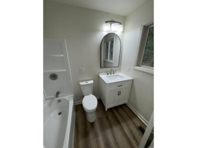 UPDATED: 2 bed 2 bath plus office. New roof, flooring, cabinets on Cortez Golf Course in Arkansas - for sale on GolfHomes.com, golf home, golf lot