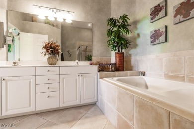 Spectacular views of the lake and golf course can be enjoyed on  in Florida - for sale on GolfHomes.com, golf home, golf lot