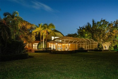 This onc of a kind residence sits on over 1.3 acres with serene on East Lake Woodlands Country Club in Florida - for sale on GolfHomes.com, golf home, golf lot