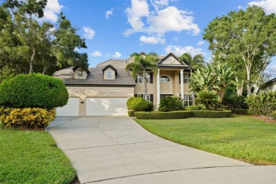 This onc of a kind residence sits on over 1.3 acres with serene on East Lake Woodlands Country Club in Florida - for sale on GolfHomes.com, golf home, golf lot