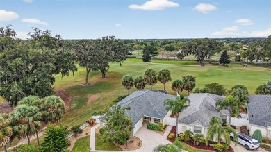 STUNNING, GOLF FRONT and WATER VIEW, 3/2 BLOCK and STUCCO on The Links of Spruce Creek in Florida - for sale on GolfHomes.com, golf home, golf lot