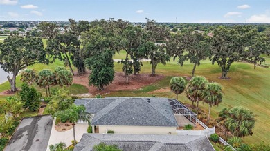 STUNNING, GOLF FRONT and WATER VIEW, 3/2 BLOCK and STUCCO on The Links of Spruce Creek in Florida - for sale on GolfHomes.com, golf home, golf lot