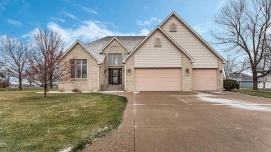 Welcome to this inviting 4-bedroom, 5-bathroom home located on River Oaks Golf Club in Minnesota - for sale on GolfHomes.com, golf home, golf lot