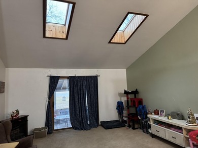 Discover the potential in this 3 bed, 2 bath ranch home on Lakes of the Four Seasons Country Club in Indiana - for sale on GolfHomes.com, golf home, golf lot