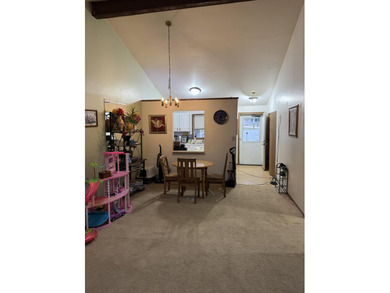 Discover the potential in this 3 bed, 2 bath ranch home on Lakes of the Four Seasons Country Club in Indiana - for sale on GolfHomes.com, golf home, golf lot