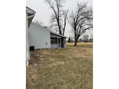 Discover the potential in this 3 bed, 2 bath ranch home on Lakes of the Four Seasons Country Club in Indiana - for sale on GolfHomes.com, golf home, golf lot