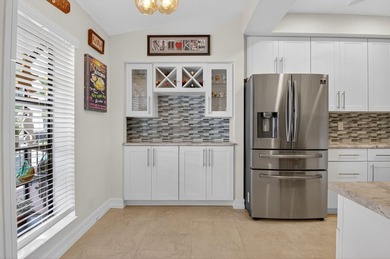 Stunning 2/2 plus den, second floor- corner condo with 1,598sq on Boca Delray Golf and Country Club in Florida - for sale on GolfHomes.com, golf home, golf lot