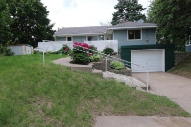 Beautifully laid out rambler is conveniently located within the on Roseville-Cedarholm Golf Club in Minnesota - for sale on GolfHomes.com, golf home, golf lot