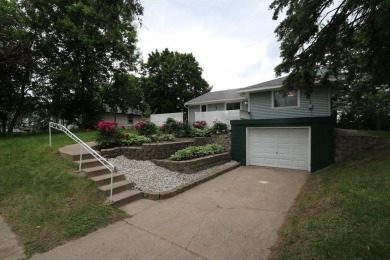 Beautifully laid out rambler is conveniently located within the on Roseville-Cedarholm Golf Club in Minnesota - for sale on GolfHomes.com, golf home, golf lot