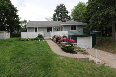 Beautifully laid out rambler is conveniently located within the on Roseville-Cedarholm Golf Club in Minnesota - for sale on GolfHomes.com, golf home, golf lot