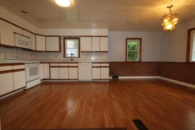 Beautifully laid out rambler is conveniently located within the on Roseville-Cedarholm Golf Club in Minnesota - for sale on GolfHomes.com, golf home, golf lot