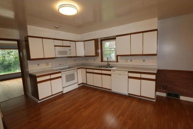 Beautifully laid out rambler is conveniently located within the on Roseville-Cedarholm Golf Club in Minnesota - for sale on GolfHomes.com, golf home, golf lot