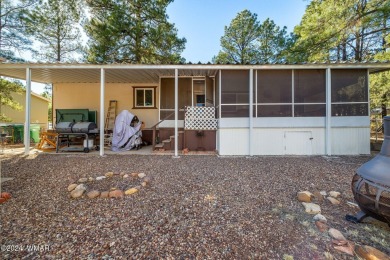 Nestled in Show Low's charming Fairway Park, this inviting on Bison Golf and Country Club in Arizona - for sale on GolfHomes.com, golf home, golf lot