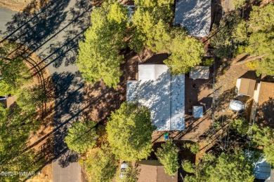 Nestled in Show Low's charming Fairway Park, this inviting on Bison Golf and Country Club in Arizona - for sale on GolfHomes.com, golf home, golf lot