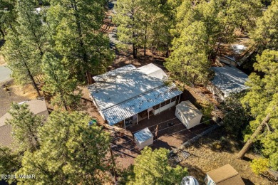 Nestled in Show Low's charming Fairway Park, this inviting on Bison Golf and Country Club in Arizona - for sale on GolfHomes.com, golf home, golf lot