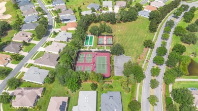 The best home on the block priced to sell! This beautifully on Arlington Ridge Golf Club in Florida - for sale on GolfHomes.com, golf home, golf lot