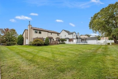 This stunning 4-bedroom, 2.5-bathroom colonial is sure to on Western Golf and Country Club in Michigan - for sale on GolfHomes.com, golf home, golf lot