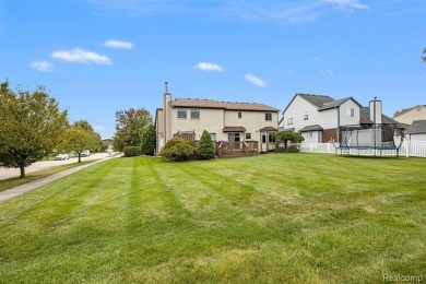 This stunning 4-bedroom, 2.5-bathroom colonial is sure to on Western Golf and Country Club in Michigan - for sale on GolfHomes.com, golf home, golf lot