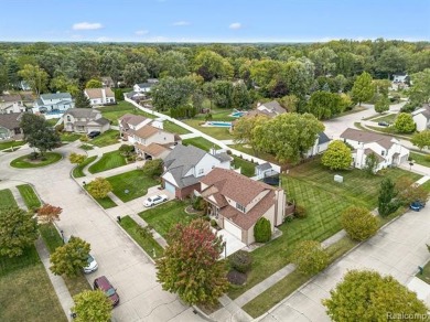 This stunning 4-bedroom, 2.5-bathroom colonial is sure to on Western Golf and Country Club in Michigan - for sale on GolfHomes.com, golf home, golf lot