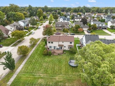 This stunning 4-bedroom, 2.5-bathroom colonial is sure to on Western Golf and Country Club in Michigan - for sale on GolfHomes.com, golf home, golf lot