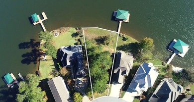 Spectacular lake front lot offering expansive water vistas and on The Patriot Golf Club At Grand Harbor in South Carolina - for sale on GolfHomes.com, golf home, golf lot