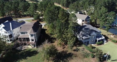 Spectacular lake front lot offering expansive water vistas and on The Patriot Golf Club At Grand Harbor in South Carolina - for sale on GolfHomes.com, golf home, golf lot